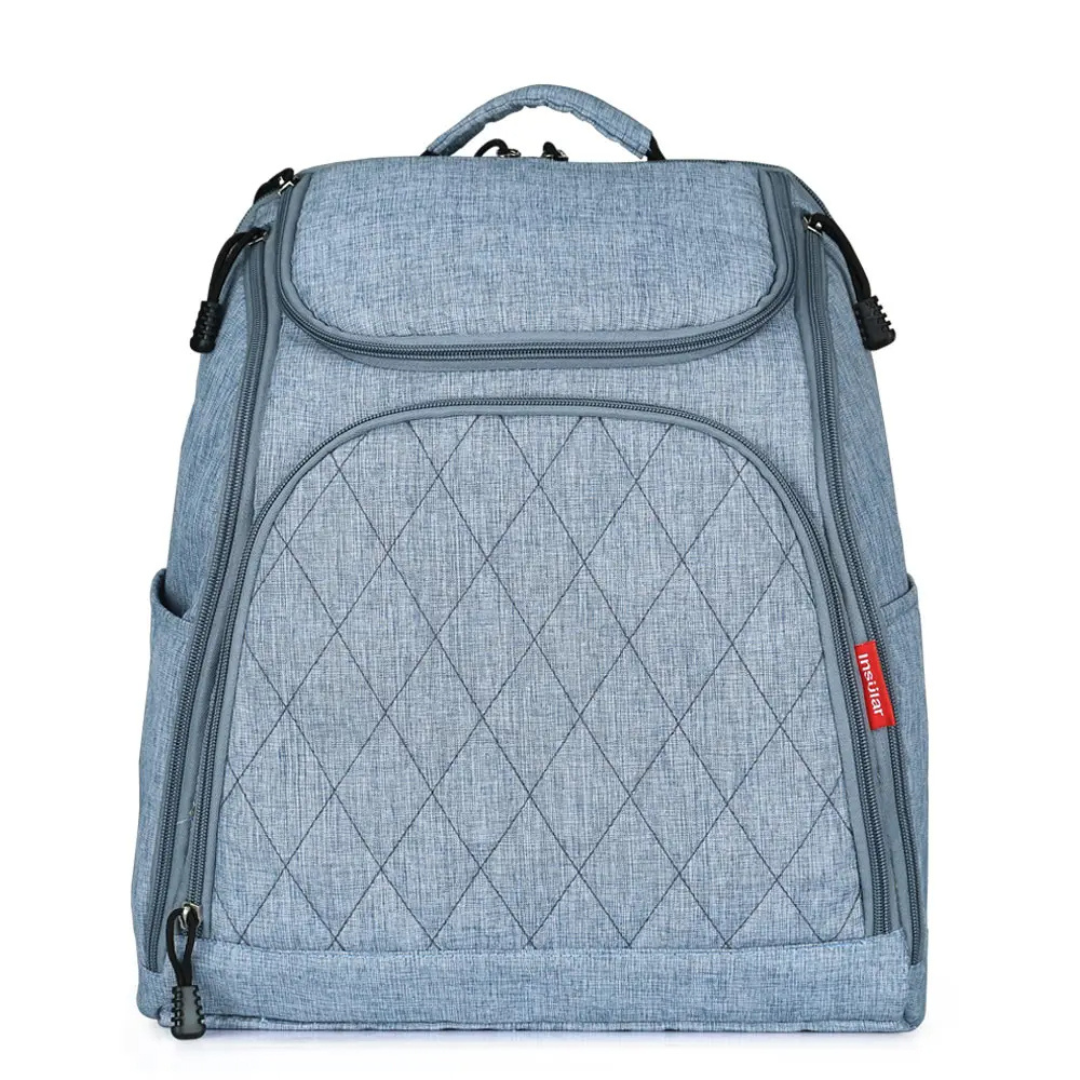 grauer wickelrucksack leicht seitlich fotografiert