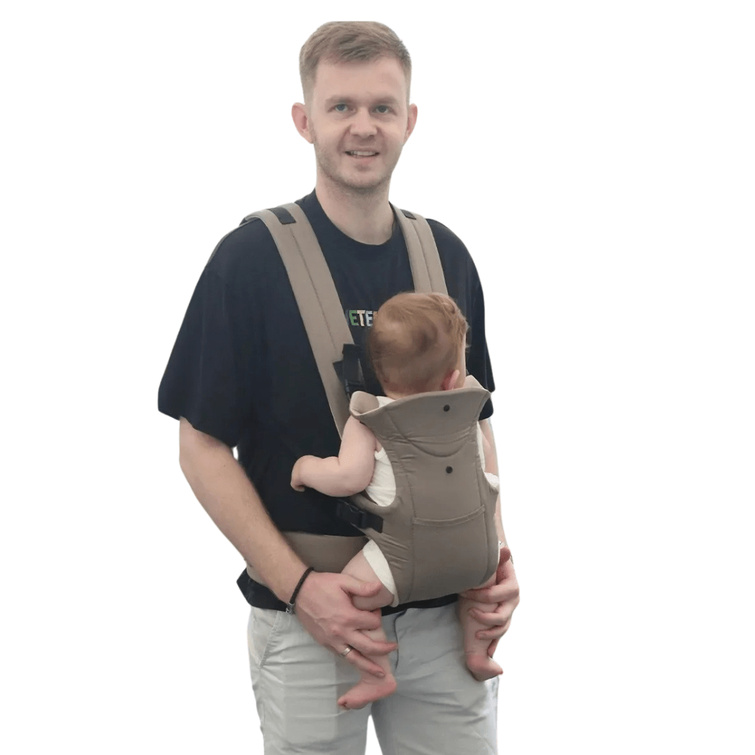 Detailfoto: gepolsterte Schultergurte & Magnetschnallen der Lacey Babytrage