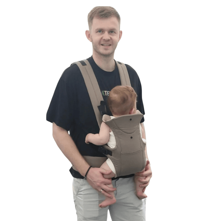 Detailfoto: gepolsterte Schultergurte & Magnetschnallen der Lacey Babytrage