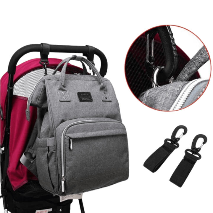 wickelrucksack am kinderwagen befestigt