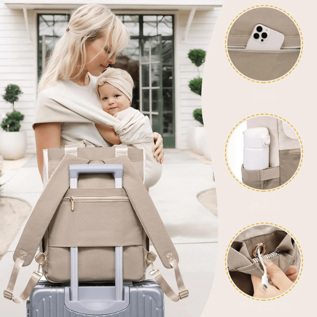 mama schiebt kinderwagen ruht wickelrucksack in park