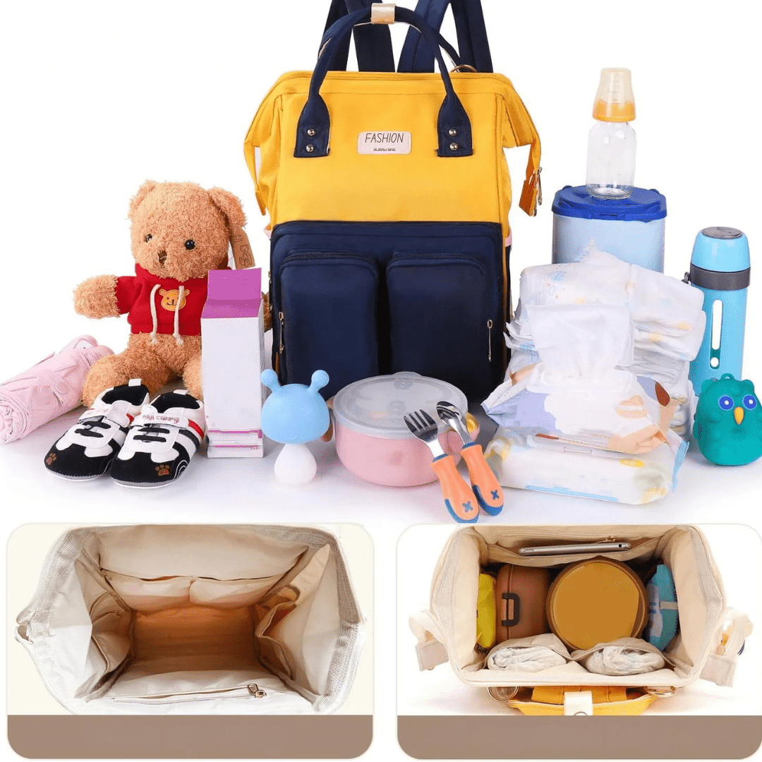 Tebby Wickelrucksack geoeffnet zeigt babyflaschen und windeln