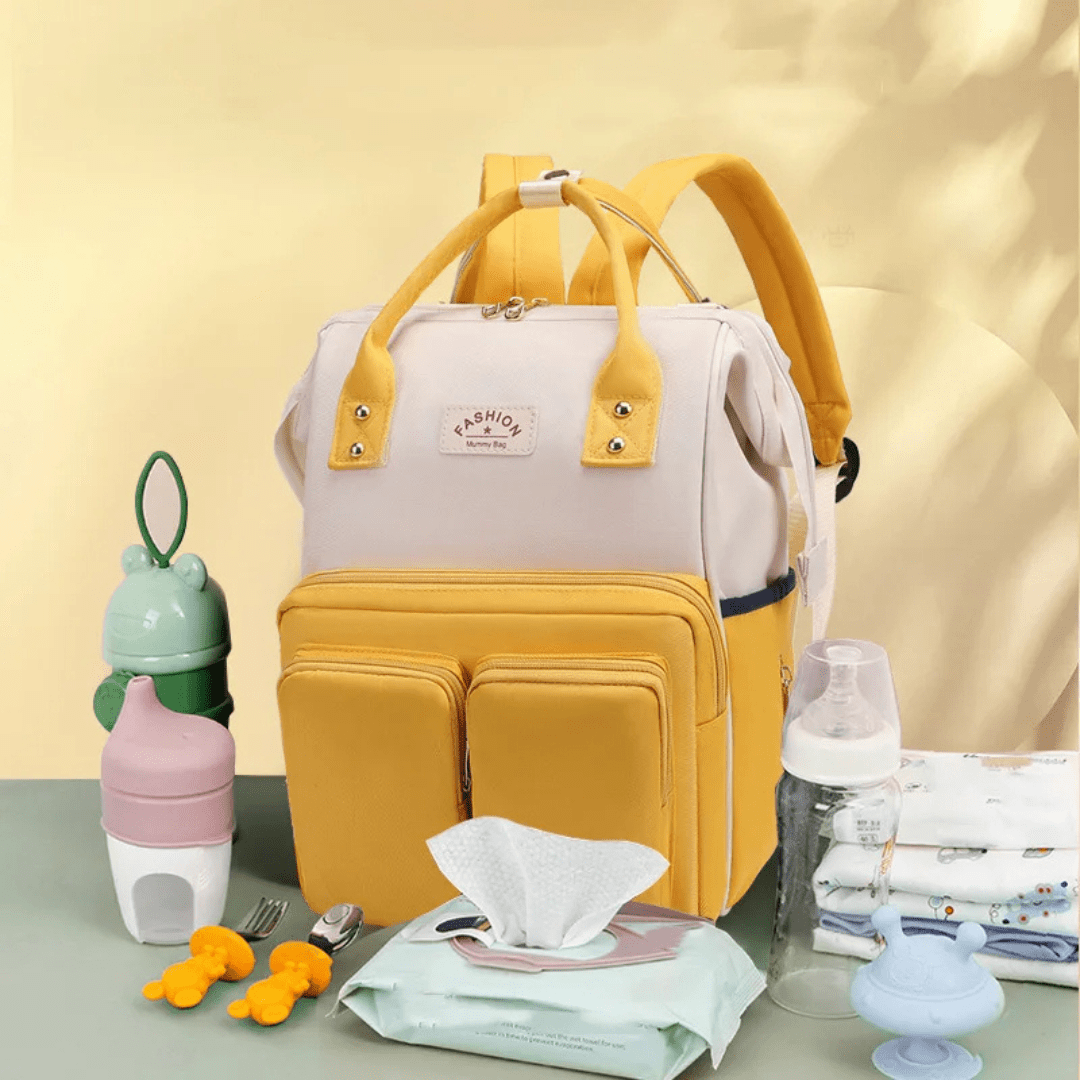 Gelber Tebby Wickelrucksack mit windelorganisation