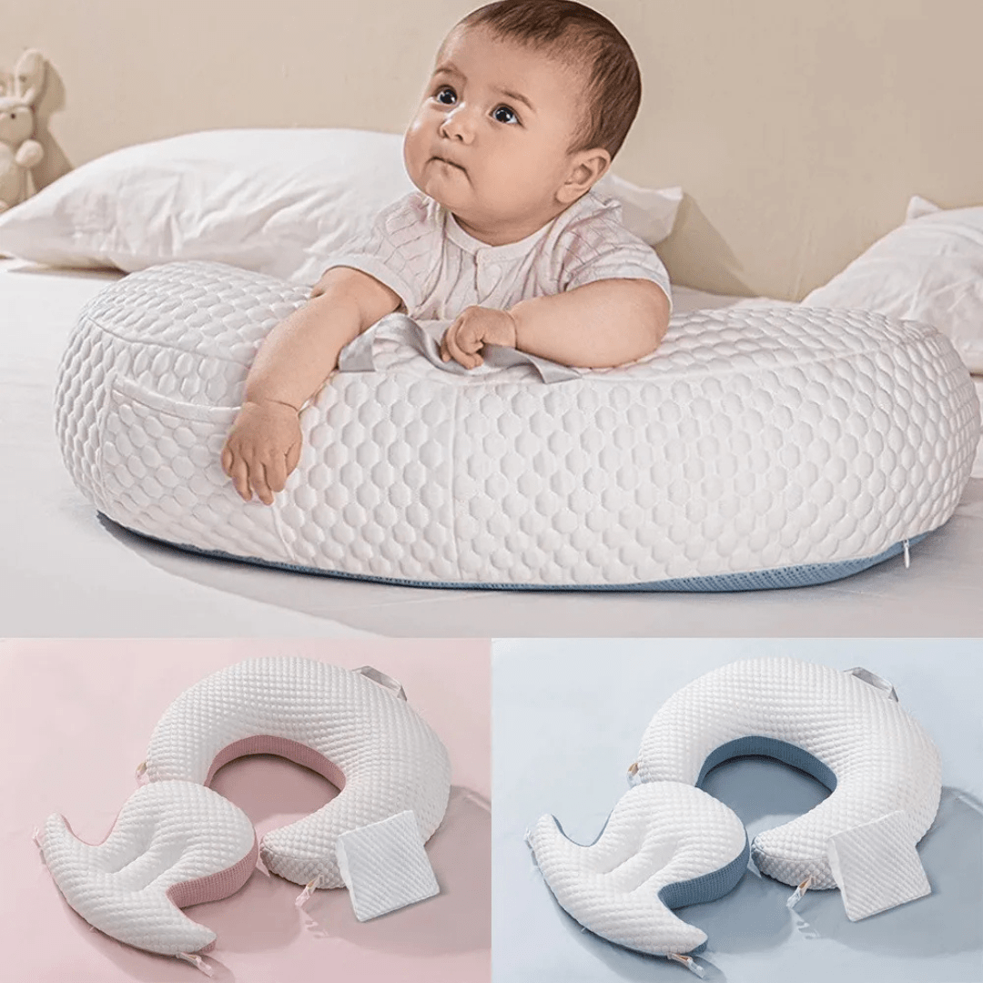 Mutter stillt ihr Baby bequem auf dem Sofa mit weißem Willow Stillkissen
